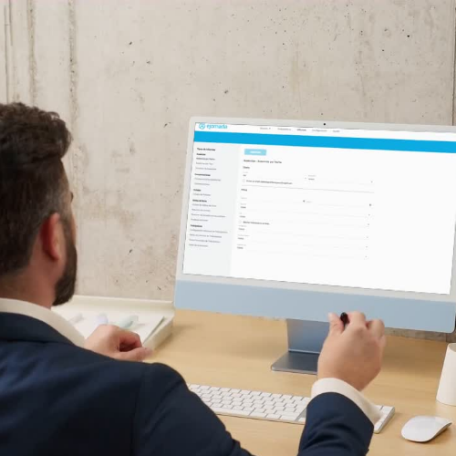 Una pantalla de ordenador en primer plano que muestra gráficos circulares y de barras minimalistas representando la asistencia y ausencia de empleados, con iconos de personas y calendarios.